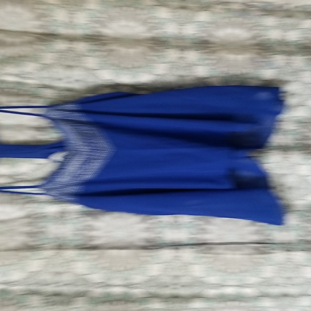 Royal blue silver detailed t back sheer top. Size XL